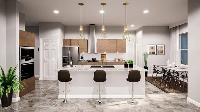 a kitchen with counter top space appliances and cabinets