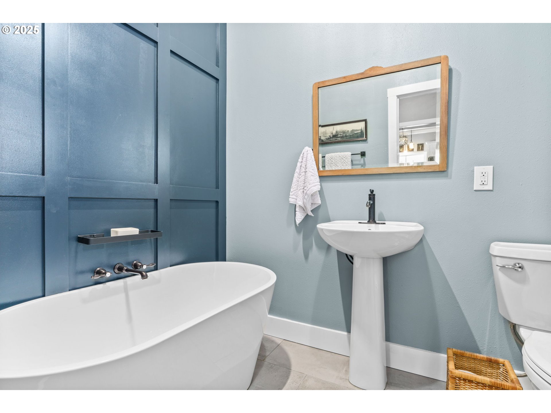 335 North H Street Cottage Grove, OR 97424 - Photo 21 of 45 a bathroom with a sink and a mirror