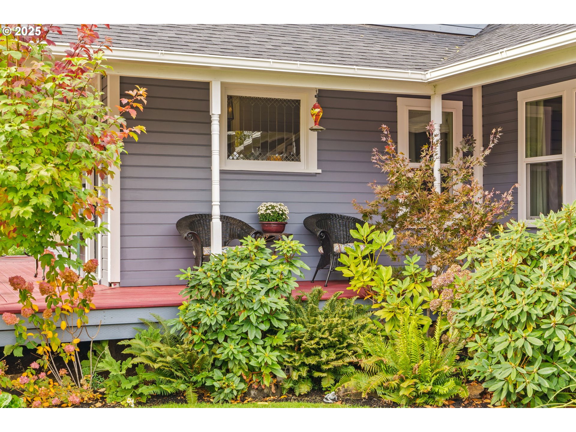 335 North H Street Cottage Grove, OR 97424 - Photo 3 of 45 a view of a backyard with plants