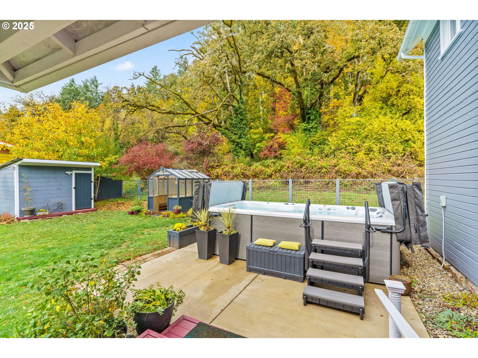335 North H Street Cottage Grove, OR 97424 - Photo 35 of 45 a view of a backyard with sitting area