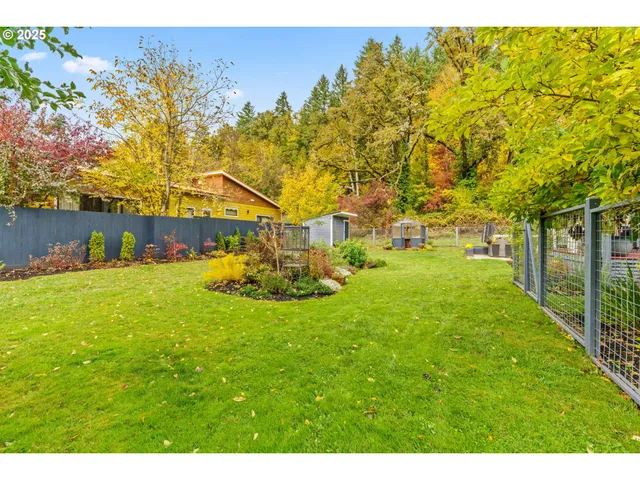 a view of a house with a big yard