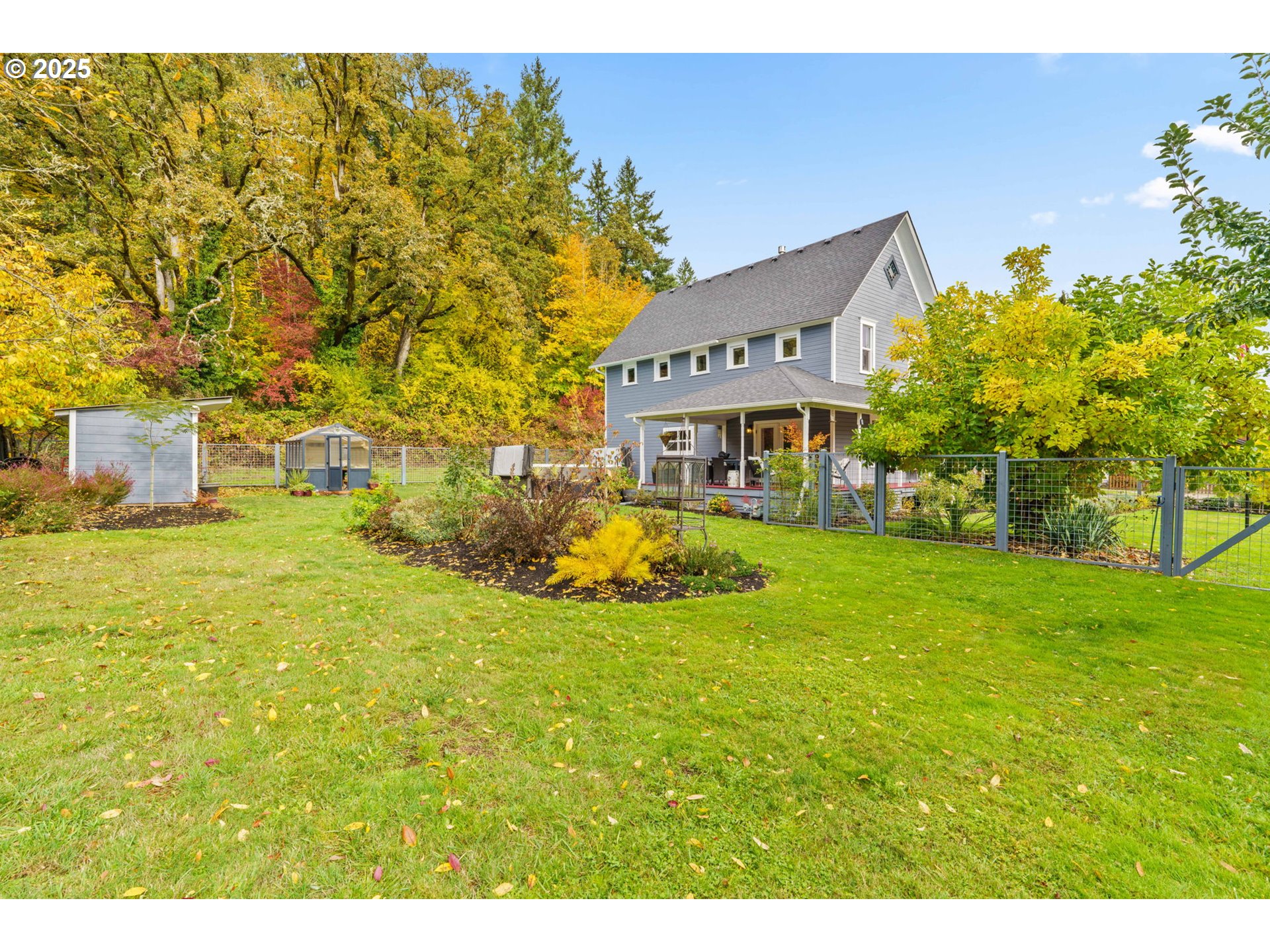 335 North H Street Cottage Grove, OR 97424 - Photo 42 of 45 a view of a house with a big yard