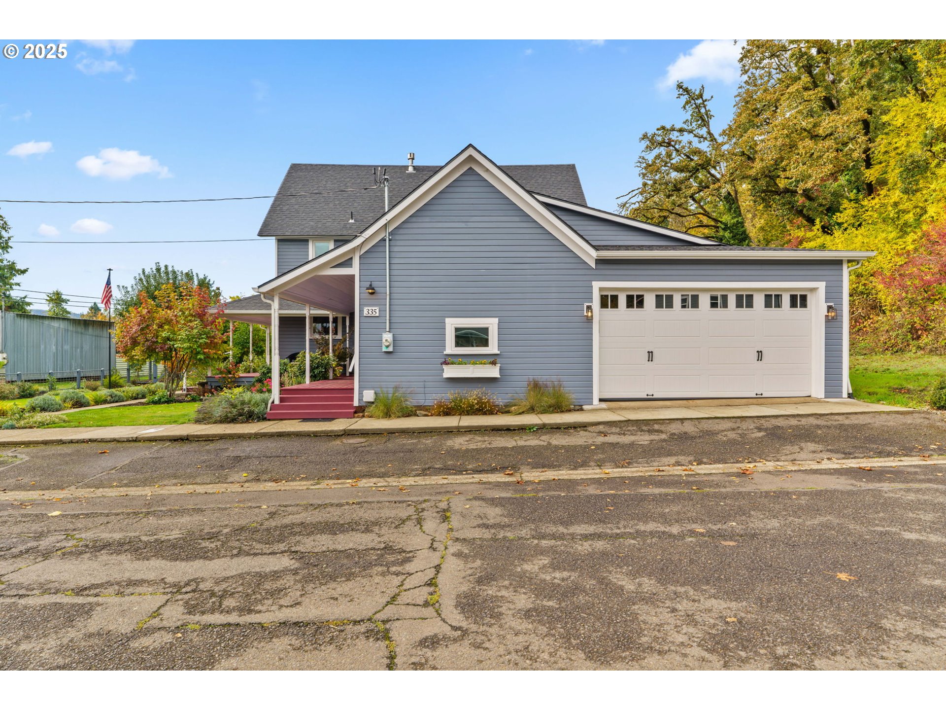335 North H Street Cottage Grove, OR 97424 - Photo 45 of 45 a view of a house with a outdoor space and street view