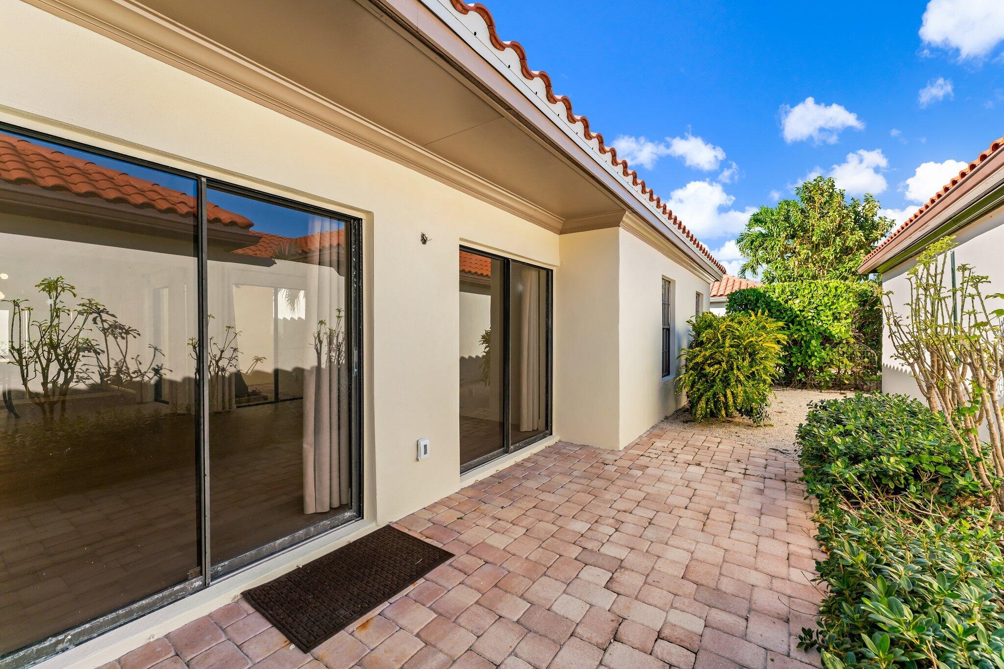 1483 Vía Del Sol Jupiter, FL 33477 - Photo 6 of 23 a view of a back yard