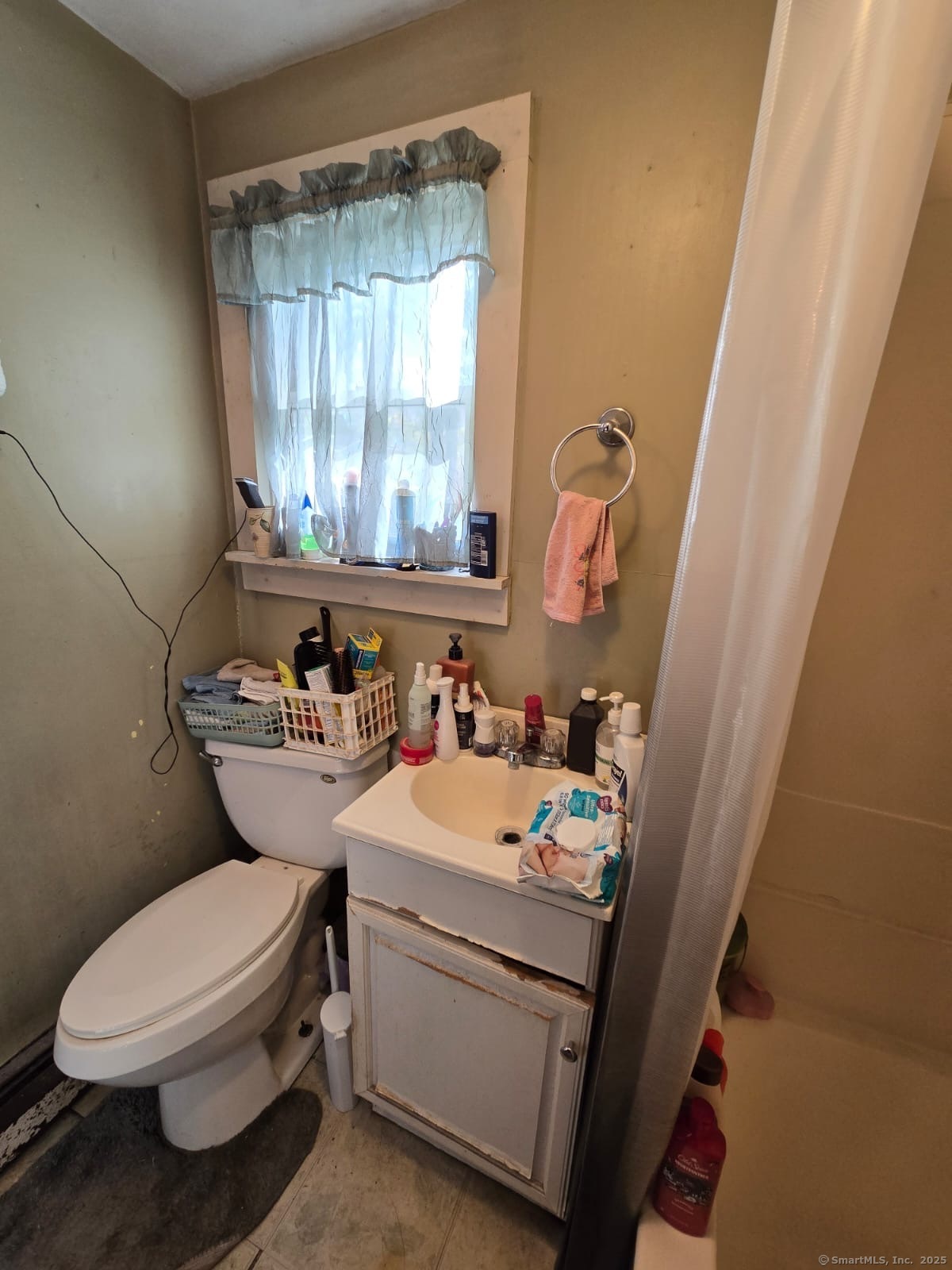 30 Riverside Drive Sprague, CT 06330 - Photo 17 of 38 a bathroom with a sink toilet and mirror