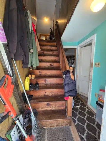 a view of entryway with a front door
