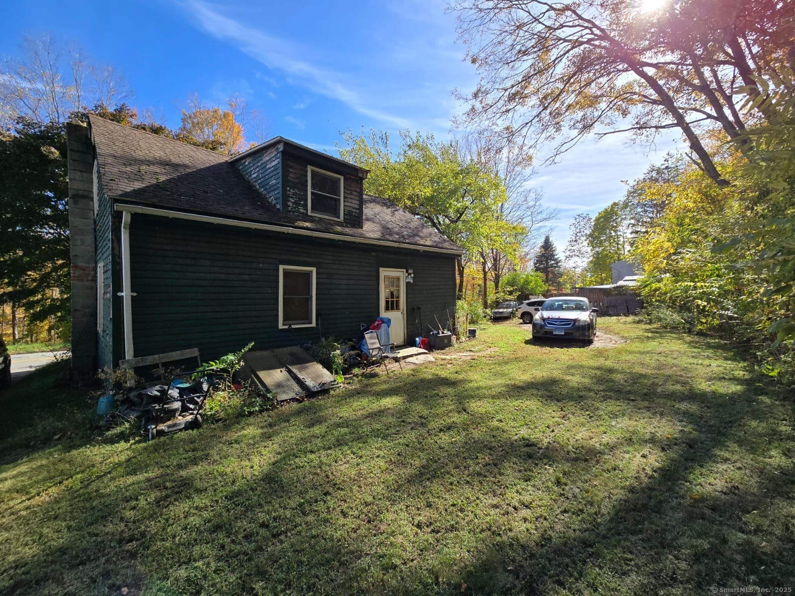 30 Riverside Drive Sprague, CT 06330 - Photo 2 of 38 a view of house with backyard space and garden