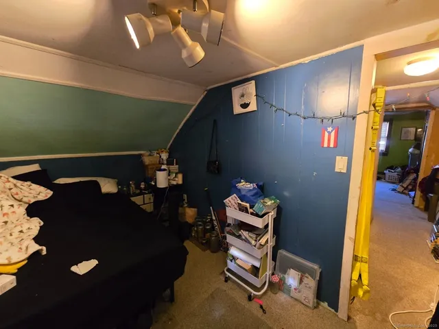 a room with furniture and a large window