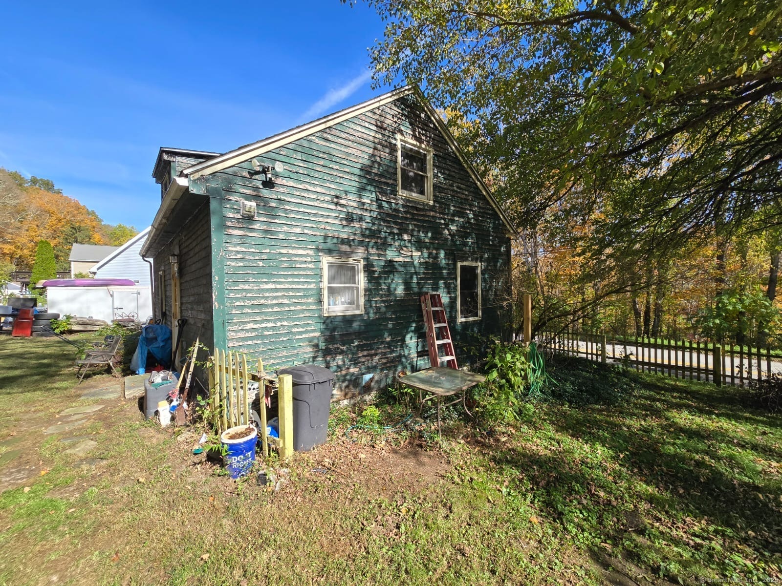 30 Riverside Drive Sprague, CT 06330 - Photo 33 of 38 a view of a house with backyard and sitting area