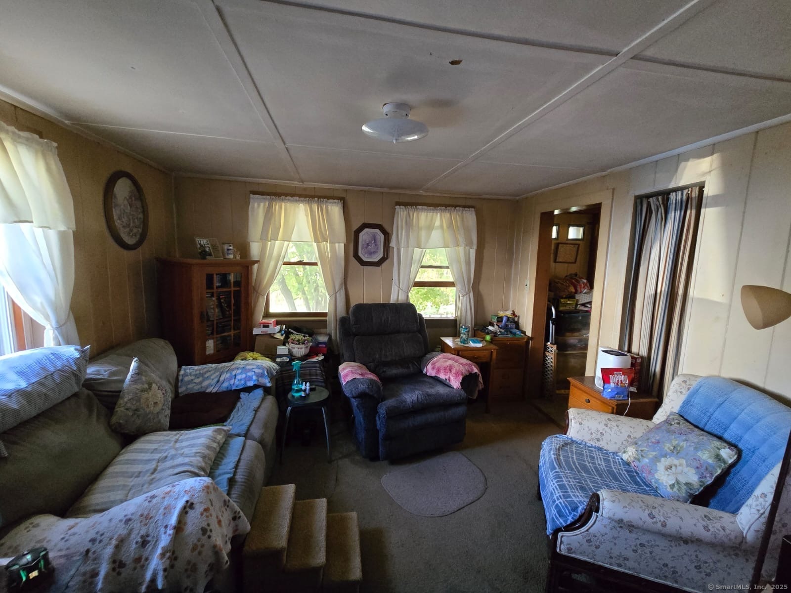 30 Riverside Drive Sprague, CT 06330 - Photo 8 of 38 a living room with furniture and a large window