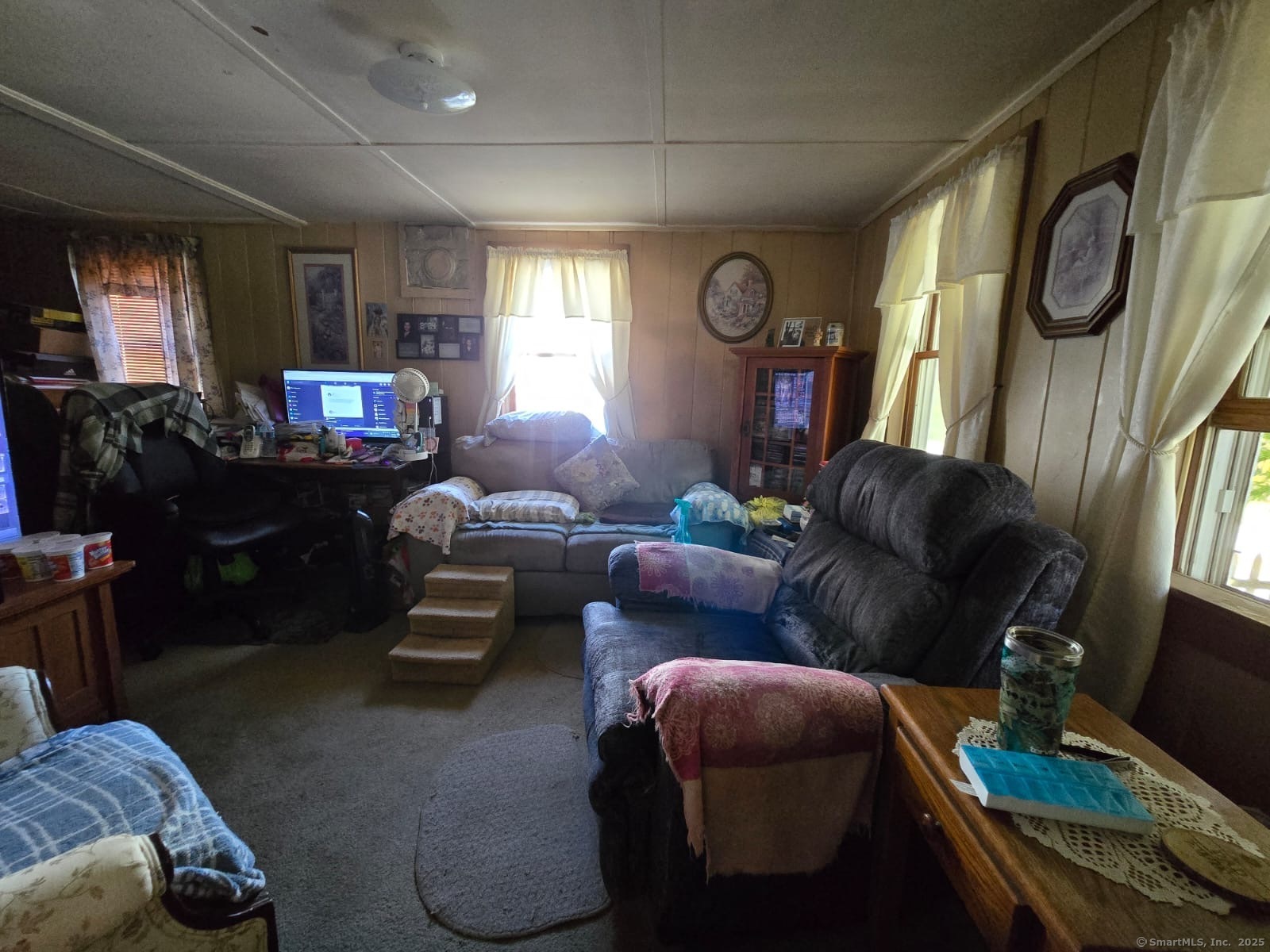30 Riverside Drive Sprague, CT 06330 - Photo 9 of 38 a living room with furniture and a window