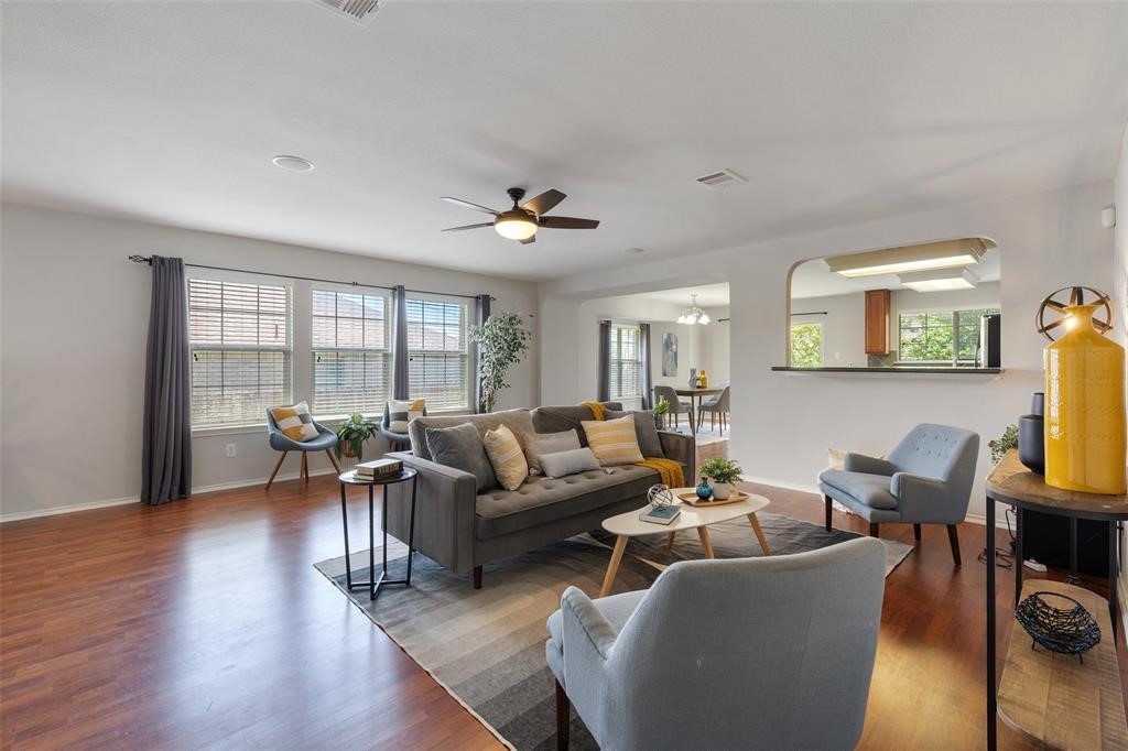 517 Castebar Drive Round Rock, TX 78664 - Photo 2 of 37 a living room with furniture and a large window