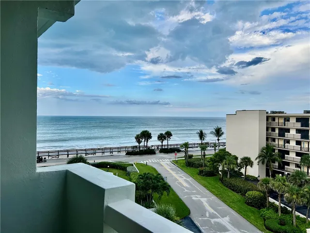 a view of a swimming pool from a terrace