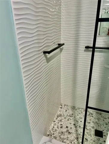 a bedroom with a bed and a table in it