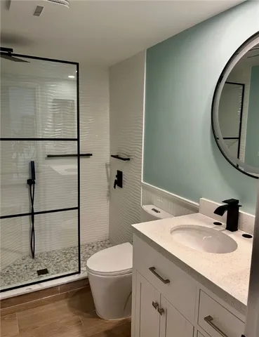 a view of a swimming pool with lounge chairs