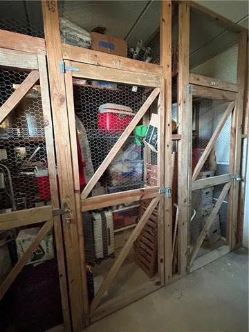 a view of a house with a yard and a garage