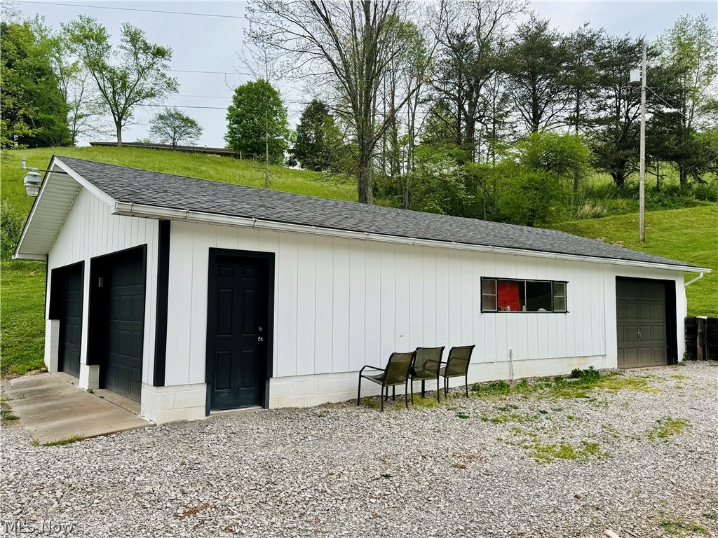 86 Cunningham Hill Road Harrisville, WV 26362 - Photo 3 of 32 View of outdoor structure with a garage