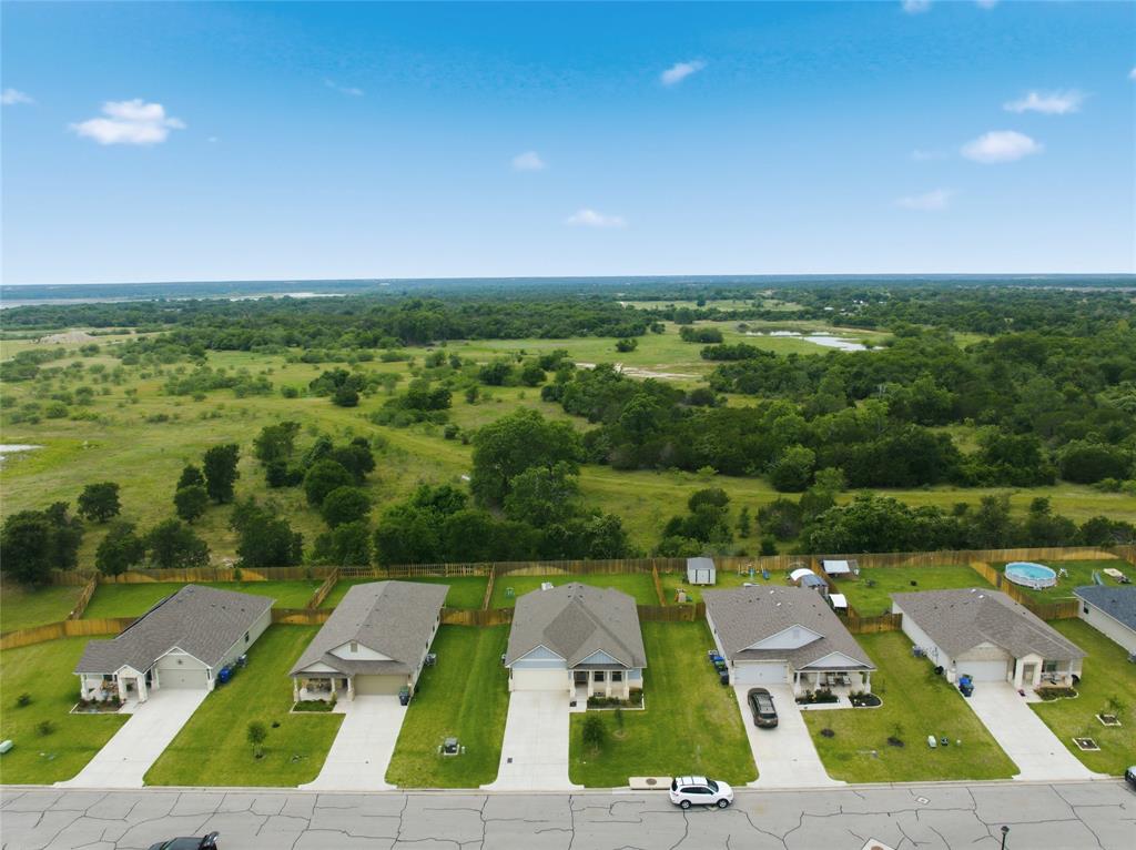 10712 Peperak Court Waco, TX 76708 - Photo 24 of 25 an aerial view of residential houses with outdoor space and street view