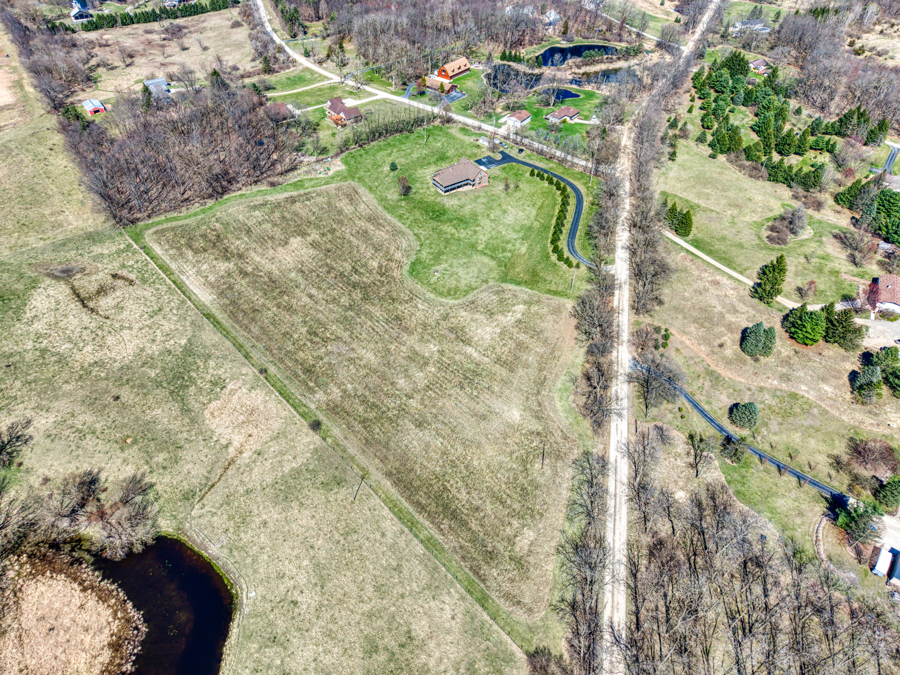 16590 Heim Road Chelsea, MI 48118 - Photo 8 of 49 DJI_20250416152705_0114_D_15