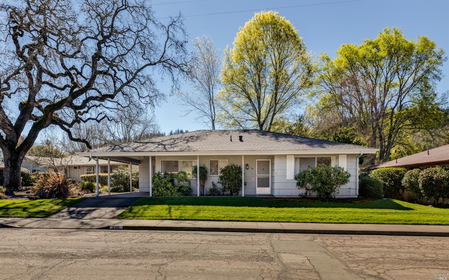 340 Green Field Circle Santa Rosa, CA 95409 - Photo 1 of 1 a front view of a house with a yard table and chairs
