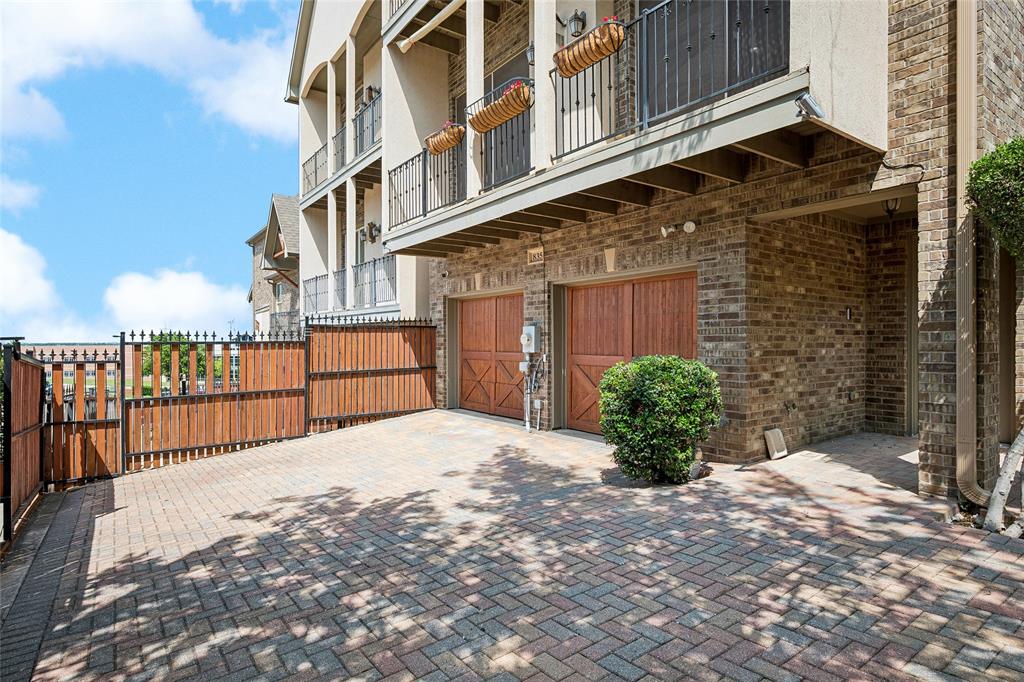 835 Rockingham Drive Irving, TX 75063 - Photo 26 of 27 a front view of a building with a yard and garage