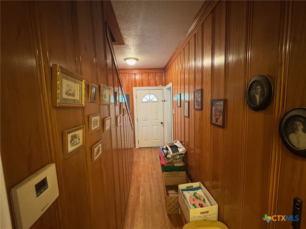 708 East 10th Street Cameron, TX 76520 - Photo 14 of 20 Downstairs Hallway off the kitchen