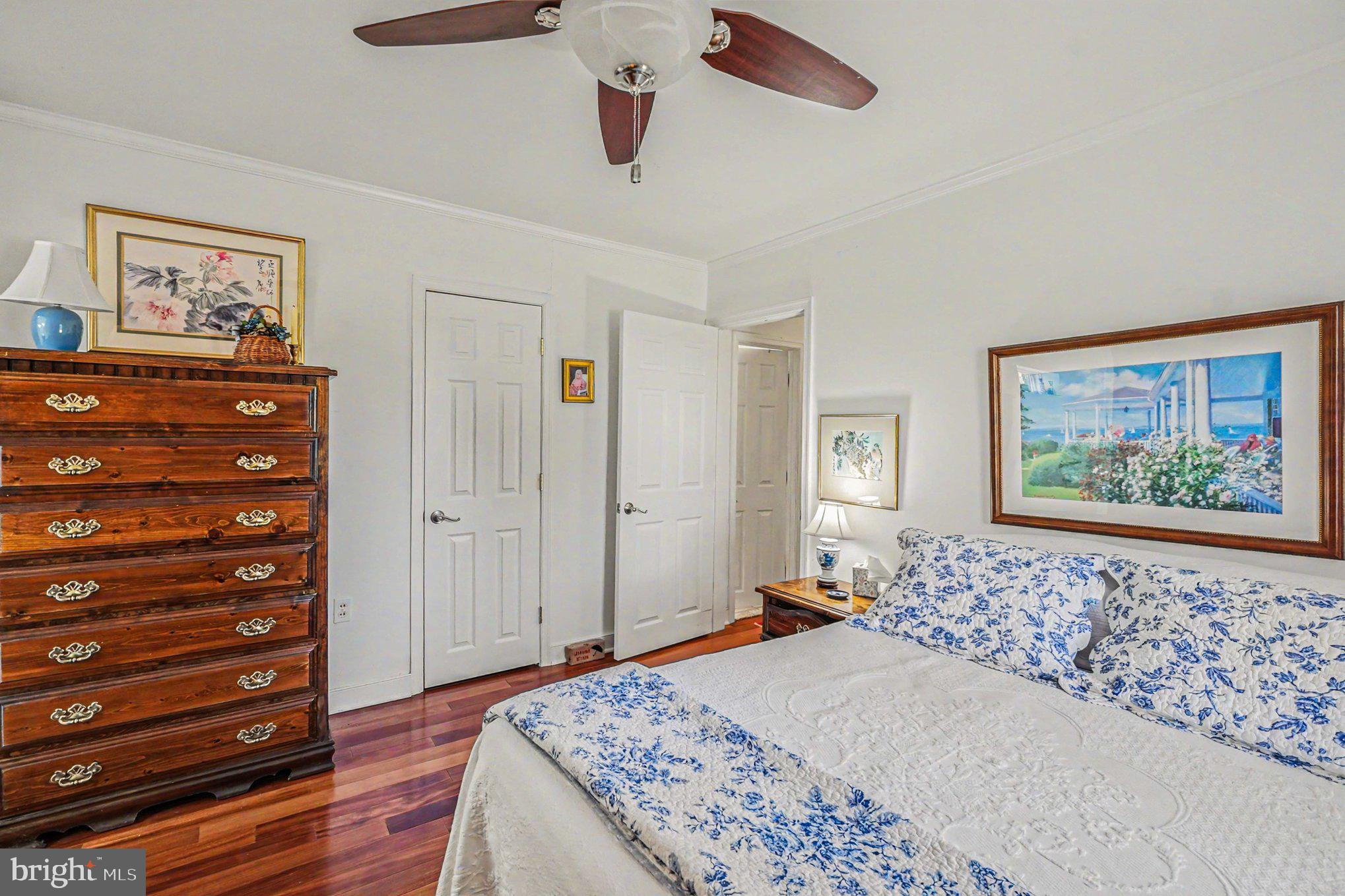 112 Midway Drive Earleville, MD 21919 - Photo 25 of 47 a bedroom with a bed and a dresser