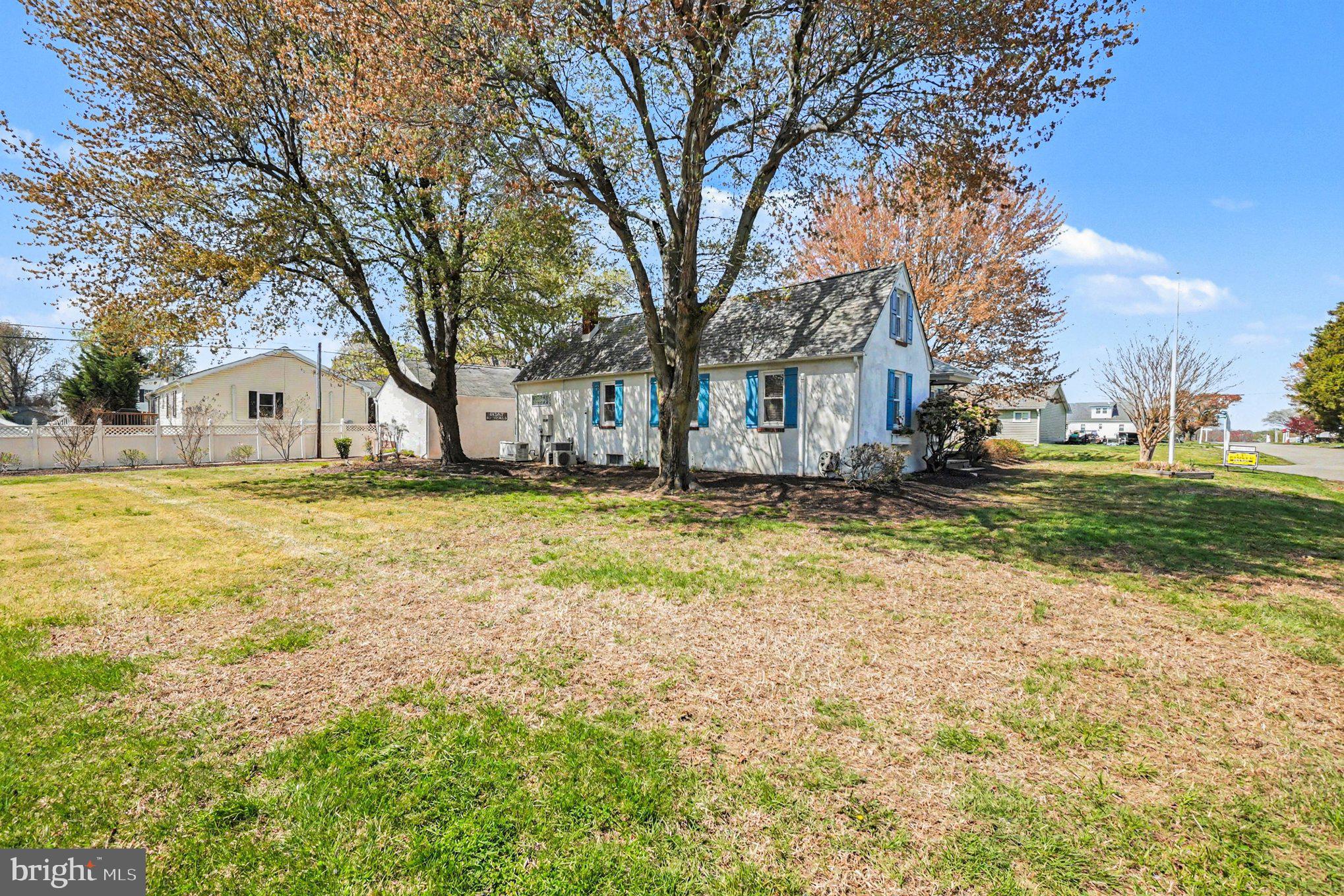 112 Midway Drive Earleville, MD 21919 - Photo 6 of 47 a house view with swimming pool in front of it