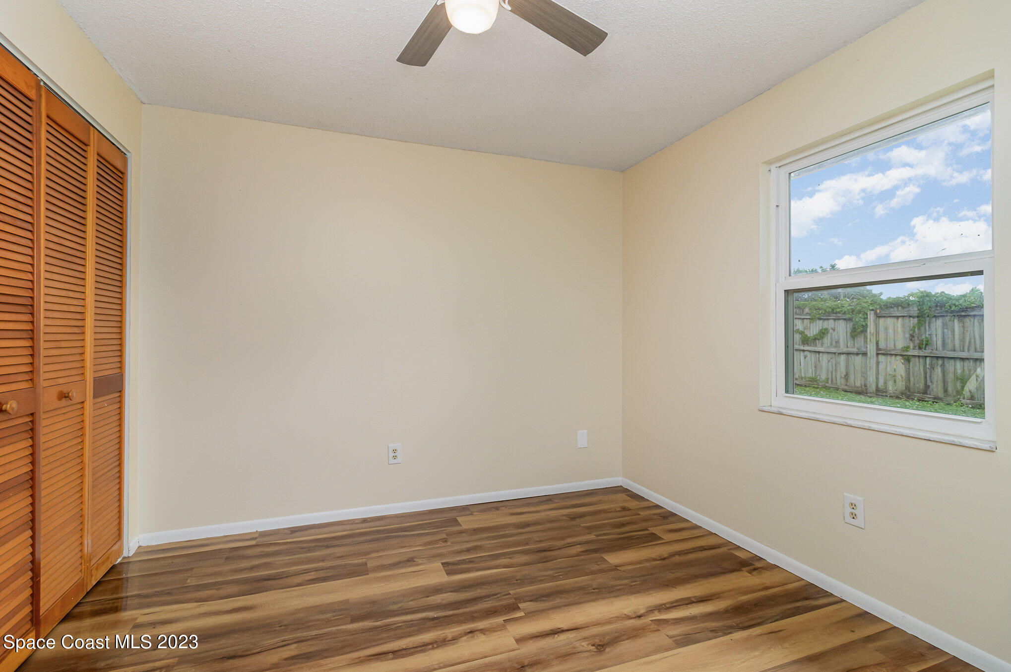 649 Croton Road Melbourne, FL 32935 - Photo 16 of 22 a view of empty room with window