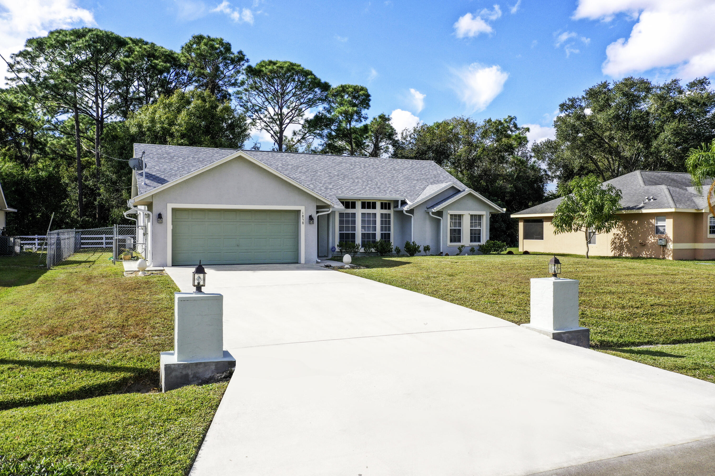 1858 Southwest Leafy Road Port St. Lucie, FL 34953 - Photo 3 of 32 Front 3