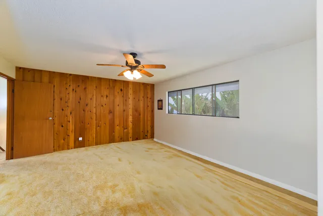 a kitchen with stainless steel appliances granite countertop a stove and a refrigerator