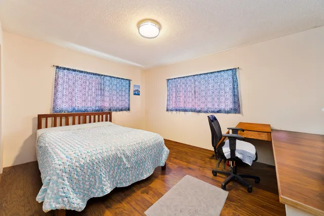 a bathroom with a sink vanity and a mirror