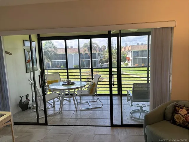 a view of a livingroom with furniture