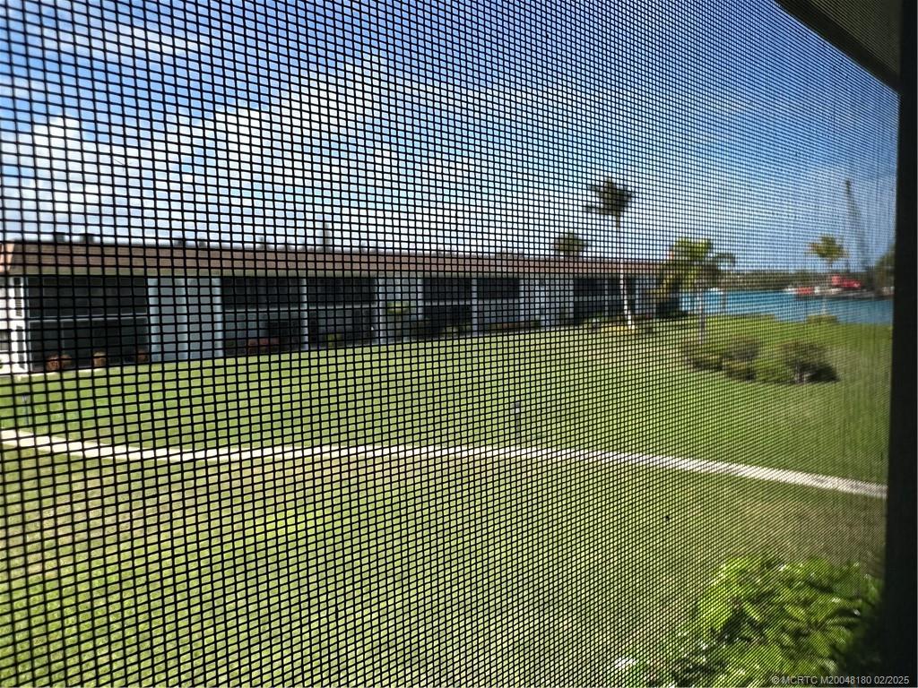 755 Saturn Street, Unit F205 Jupiter, FL 33477 - Photo 8 of 19 a view of a swimming pool