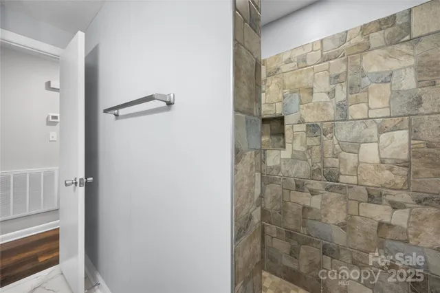 a view of room with wooden floor and window