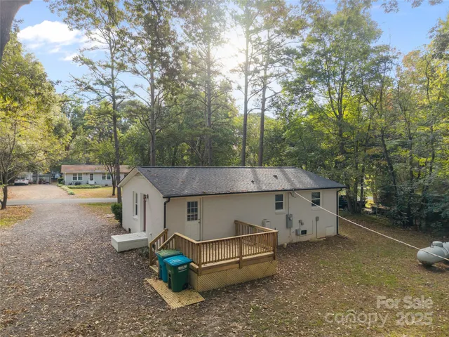 a view of a yard with an outdoor space