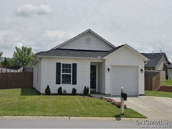 91 West Swift Creek Road Fletcher, NC 28732 - Photo 1 of 14 a front view of a house with a yard