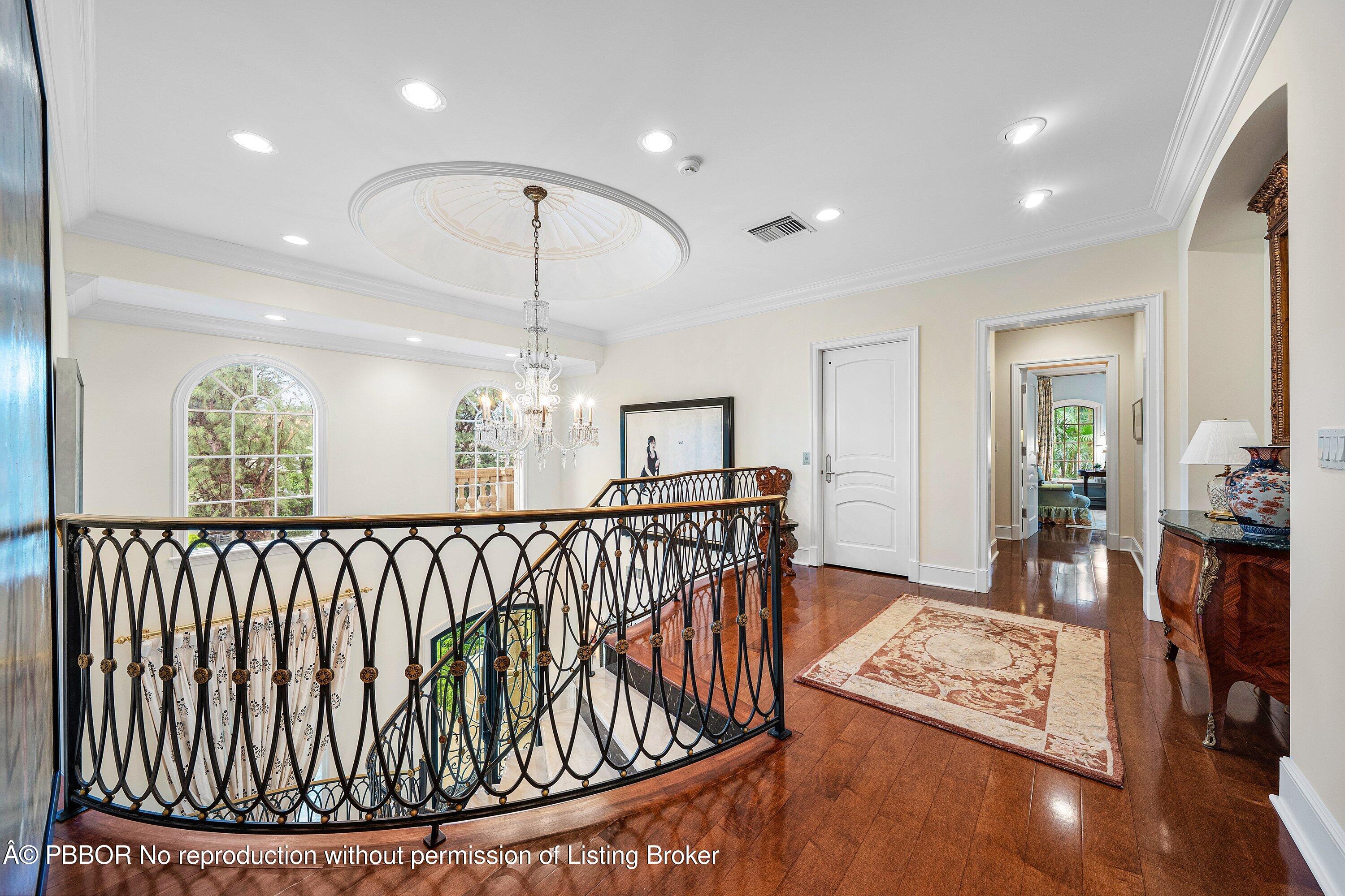 242 Wells Road Palm Beach, FL 33480 - Photo 20 of 54 a view of entryway and hall with wooden floor