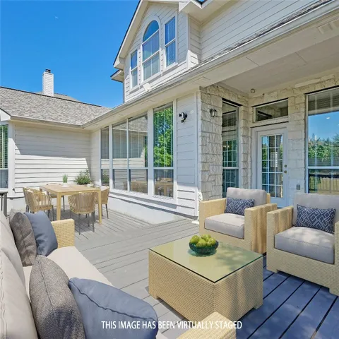 a view of deck with wooden floor and fence