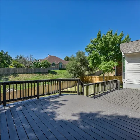 a view of deck with a yard