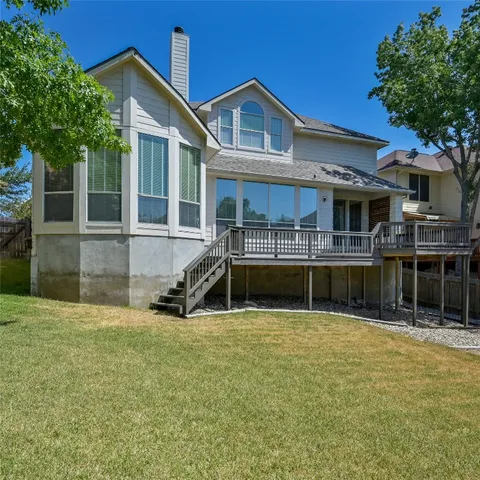 a view of swimming pool with a yard