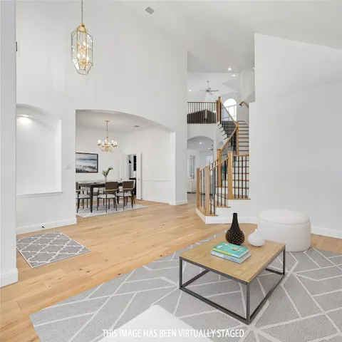 a view of kitchen with furniture and wooden floor