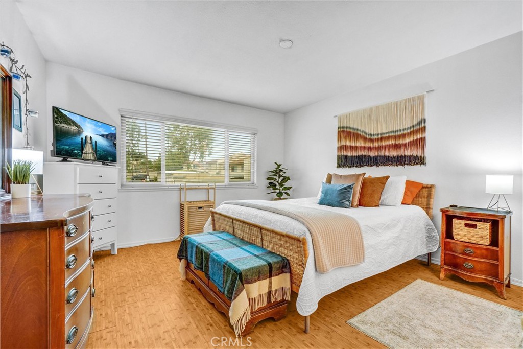 1514 Via Del Rio Corona, CA 92882 - Photo 17 of 41 a spacious bedroom with a bed and window