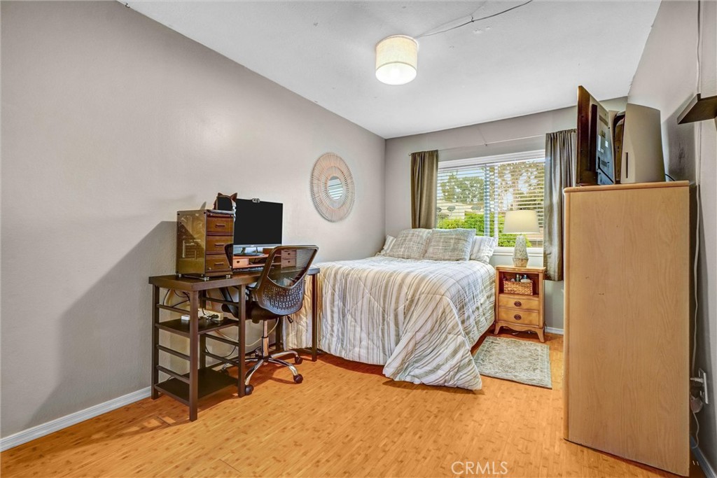 1514 Via Del Rio Corona, CA 92882 - Photo 21 of 41 a bedroom with a bed a computer on desk and a chair