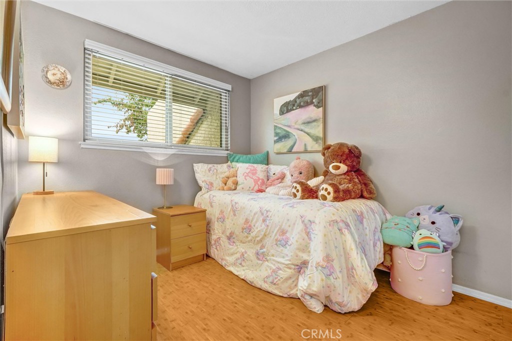 1514 Via Del Rio Corona, CA 92882 - Photo 23 of 41 a bed sitting in a bedroom next to a window