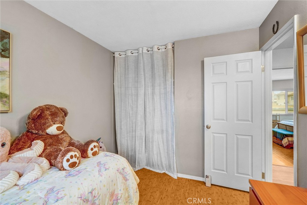 1514 Via Del Rio Corona, CA 92882 - Photo 24 of 41 a bedroom with a bed and a window