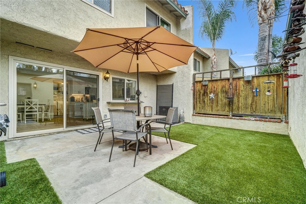 1514 Via Del Rio Corona, CA 92882 - Photo 28 of 41 a patio with a yard table and chairs