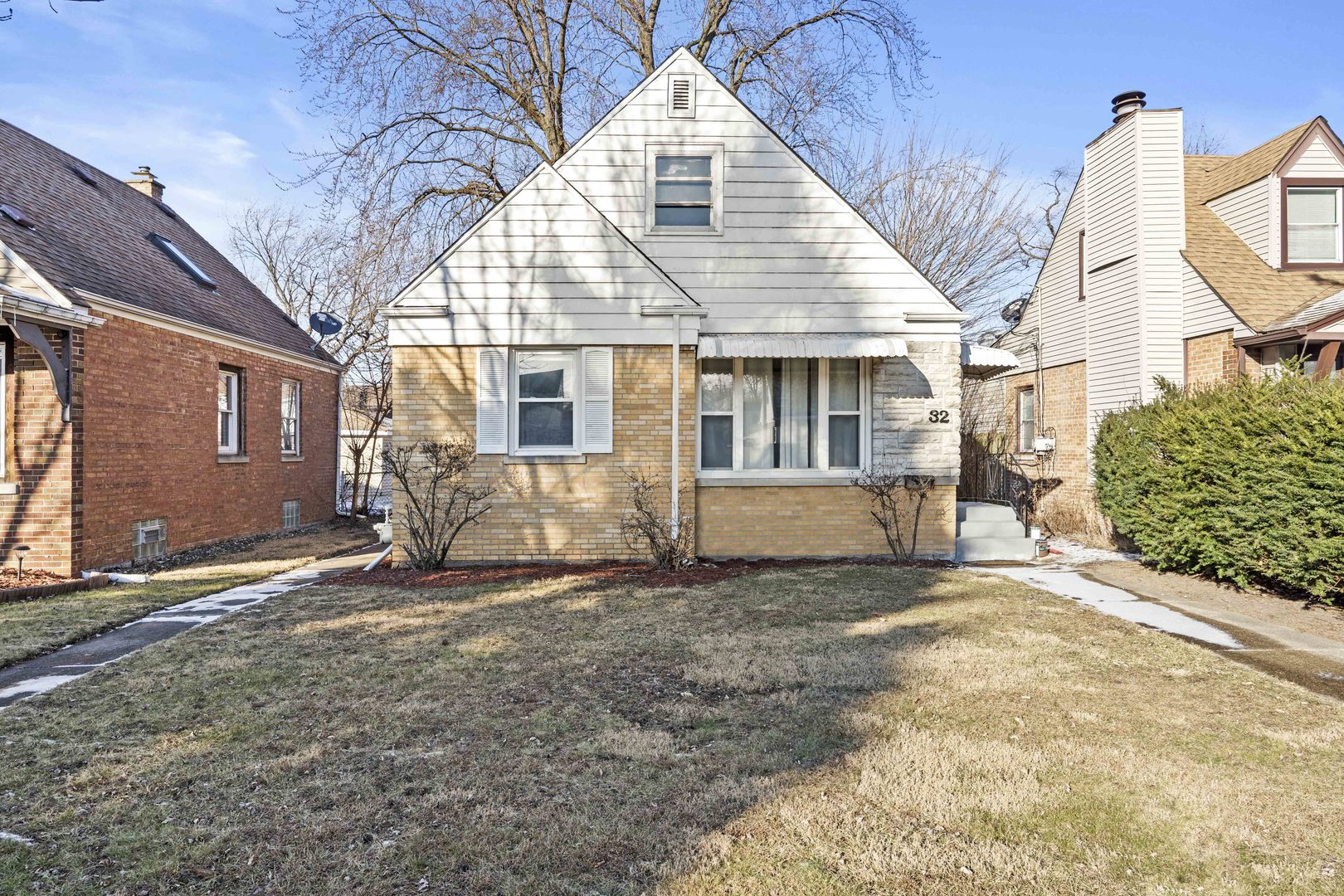 32 166th Place Calumet City, IL 60409 - Photo 1 of 18 a view of a house with a yard