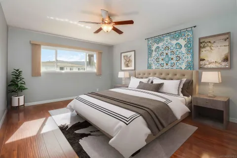 a bedroom with bed and a window