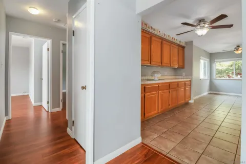 a view of a kitchen from the hallway